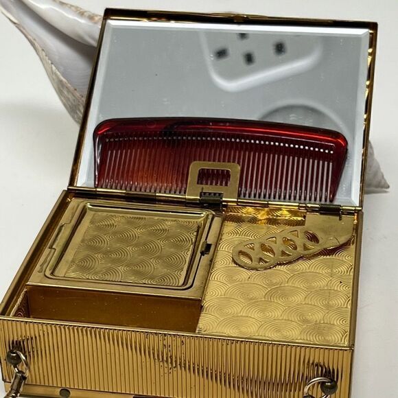 Vintage, gold tone compact/purse.  
